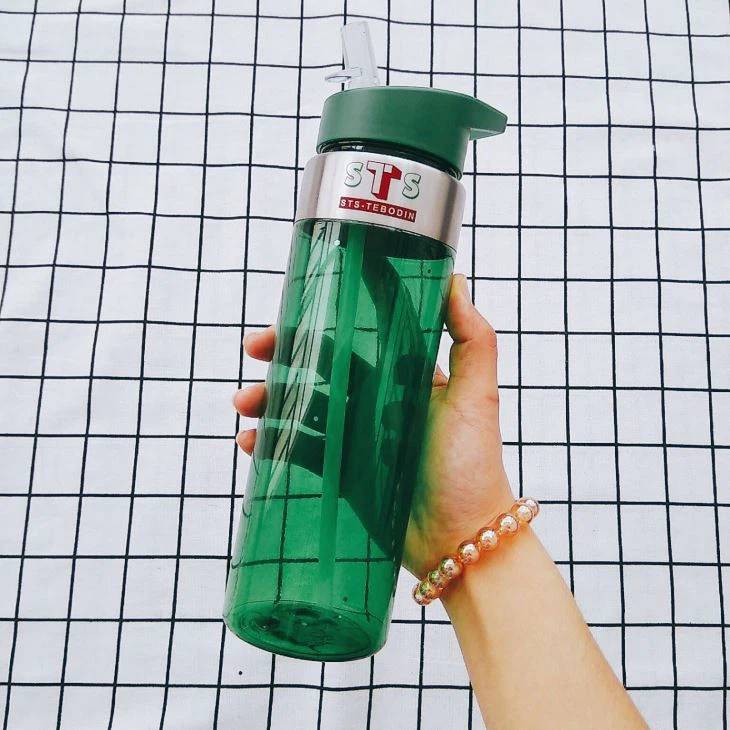 Juice bottle with straw